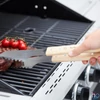 Kép 2/3 - Barbecook BC-ACC-7070 luxus rozsdamentes acél fogó, gumifa nyél, 100% FSC, 40cm