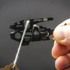 Kép 3/6 - True Utility Fishface, TU206K, 18 in 1, csavarkulcs, laposfejű csavarhúzó, fekete titánbevonat, rozsdamentes acél váz